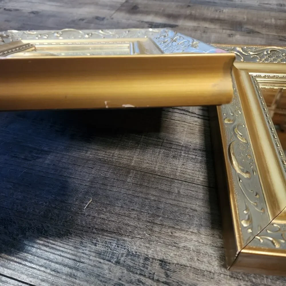 2 intricate wood framed mirrors. See damage in pictures V